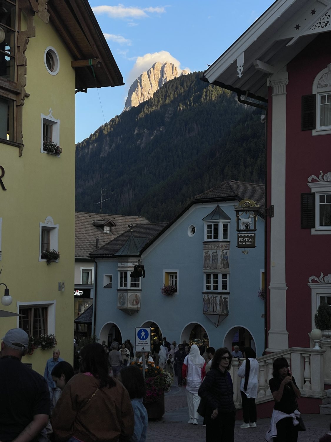 Town below, last light on the rock